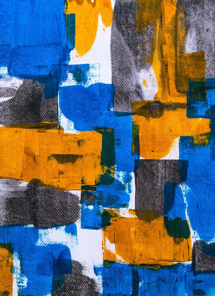 Dynamic abstract painting featuring bold blue and orange hues with textured patterns.